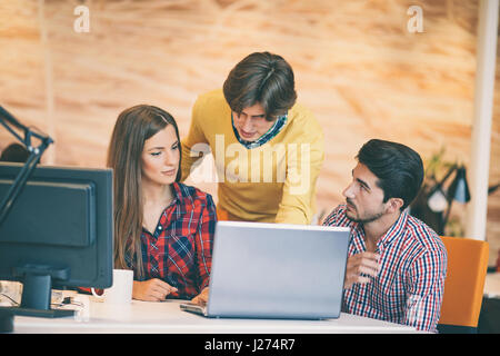startup business people group working as team to find solution to problem Stock Photo