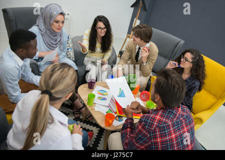 Shot of a group of young business professionals having a meeting. Stock Photo
