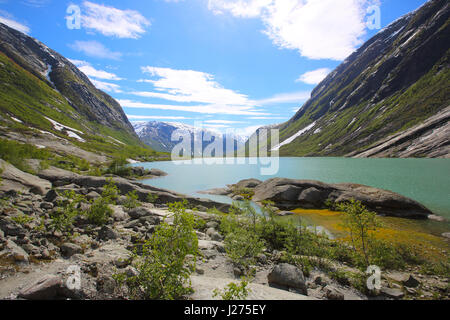 river in the valley Jostedalen, near Gaupne, Norway, turquoise water of ...