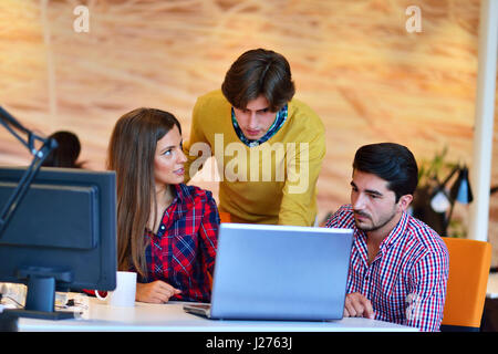 Teamwork. Three young architects working on a project Stock Photo