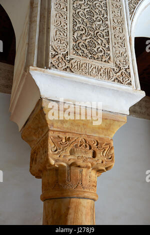 Berber arabesque Morcabe plasterwork of the 14th century Ben Youssef Madersa (Islamic college) re-constructed by the Saadian Sultan Abdallah al-Ghalib Stock Photo