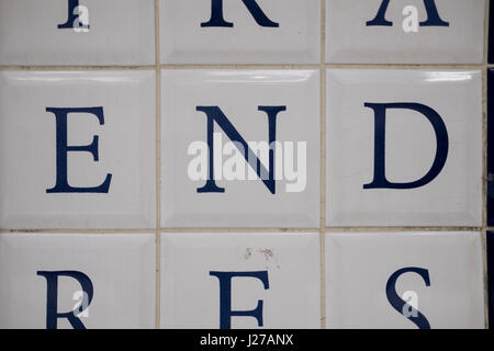 Words constructed from the letter tiles at the Place de la Concorde station in Paris, France. Stock Photo