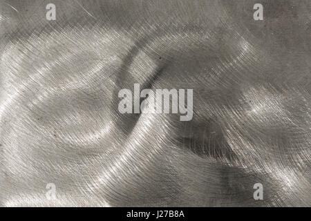 Abstract scratched, textured metallic background Stock Photo