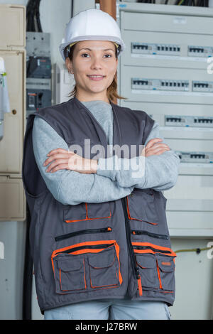 woman posing next to a panel Stock Photo