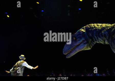 Tokyo, Tokyo, Japan. 25th Apr, 2017. The Dino-Safari exhibition featuring these robotic dinosaurs in Tokyo, Japan. The rubber creatures make use of a 'Dino-Tronics' mechanism, which allows them to smoothly and quietly walk around, and move their heads and jaws. However the dinosaurs are not completely autonomous - performers encased in the models control their movements.The animatronics were created by Japanese firm ON-ART Corp. The exhibit, set to open on Apr. 26 at Hikarie Hall in Tokyo's Shibuya district, will feature the 4.8m tall Raptor, the 8m Tyrannosaurus Rex and the 6.5m Triceratop Stock Photo