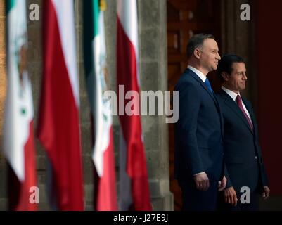 Mexican President Enrique Pena Nieto, right, stands with Polish President Andrzej Duda during a bilateral signing ceremony at the national palace April 24, 2017 in Mexico City, Mexico. Stock Photo