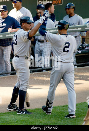 Yankees' Alex Rodriguez is congratulated at home after hitting a solo ...