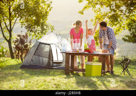 Happy family on vacation in the mountains Stock Photo - Alamy
