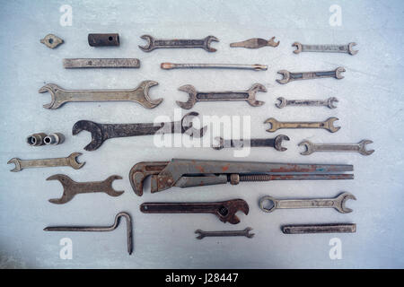 Overhead view of hand tools arranged on table Stock Photo