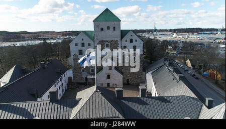 Aerial view of a flag waving infont of Turun linna, the castle of turku, in Finland Stock Photo