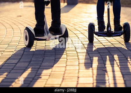 Male Legs On Electrical Scooter Outdoors Gyroscooter Personal Transport Stock Photo