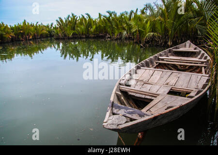 Old fishing boat in Hoi An, vietnam. Stock Photo
