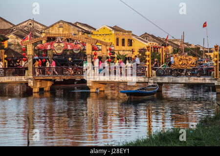 A busy bridge in Hoi An, Vietnam. Stock Photo