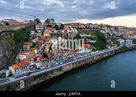 Aerial view from Dom Luis I Bridge on the old part of Porto, Portugal. View with Fernandina Wall and Guindais Funicular Stock Photo