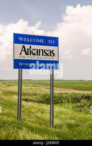 State of Arkansas welcome sign tells you it is The Natural State and to buckle up for safety Stock Photo