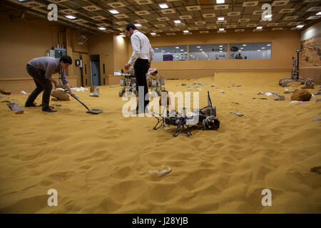 A small scout prototypes for the ESA ExoMars rover mission to Mars is tested by Airbus in a warehouse made to look like the Red Planet Stock Photo