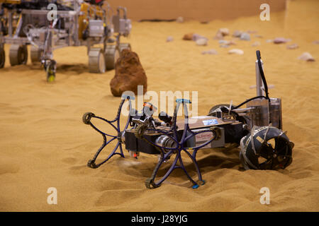 A small scout prototypes for the ESA ExoMars rover mission to Mars is tested by Airbus in a warehouse made to look like the Red Planet Stock Photo