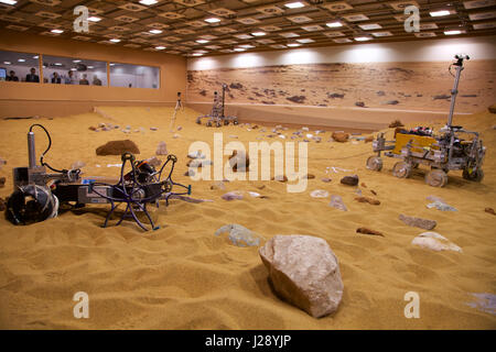 A small scout prototypes for the ESA ExoMars rover mission to Mars is tested by Airbus in a warehouse made to look like the Red Planet Stock Photo