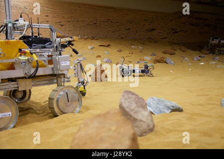 A small scout prototypes for the ESA ExoMars rover mission to Mars is tested by Airbus in a warehouse made to look like the Red Planet Stock Photo