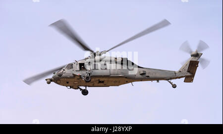 MH60S Helicopter from USNS Robert E Peary on approach to RNAS Culdrose Stock Photo
