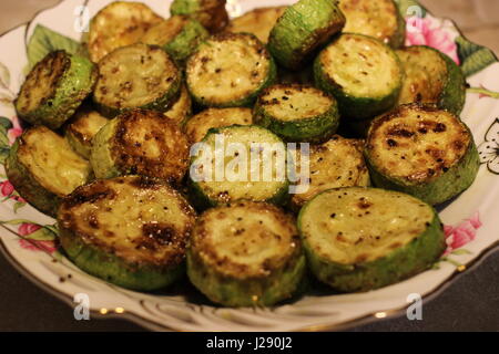Fried zucchini with crust on the plate Stock Photo