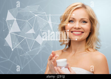 woman with moisturizer and low poly projection Stock Photo