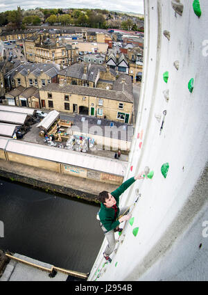 Team GB climber Luke Murphy on the UK's highest man-made outdoor climbing wall ahead of opening of ROKTFACE in Yorkshire. Stock Photo