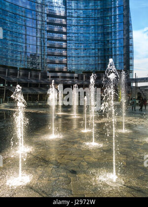 Splashing water in Gae Aulenti square. Milan, Lombardy. Italy Stock Photo