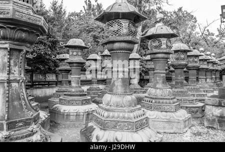 Large group of japanese traditional lanterns or light towers (Toro, dai-doro). Ueno Toshogu Shrine main gate. Located in Ueno Park, Taito ward, Tokyo Stock Photo