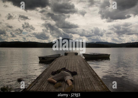 Fall man - lack of strength, depression, addiction Stock Photo