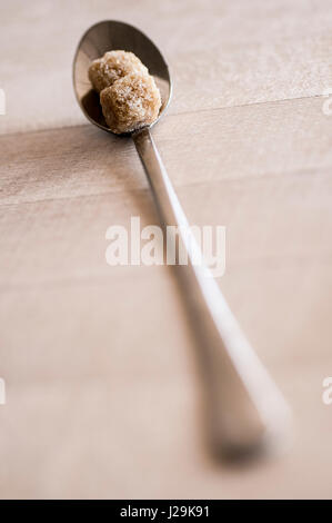 Close up view Sugar cubes Spoon Brown sugar Nobody Stock Photo