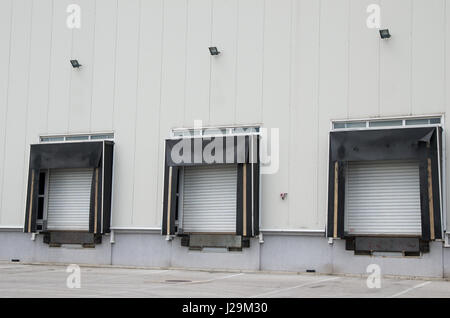 Front view of loading docks of warehouse. Loading platform Stock Photo