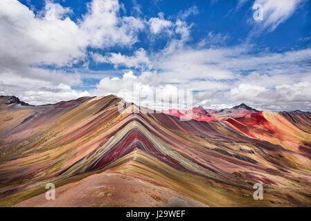Perù Vinicunca, also called Montaña de Siete Colores, is a mountain in Perù with an altitude of 5.200 meters above sea level. It is located in the Andes of Perù, in the Cusco Region. Stock Photo