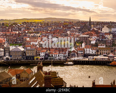 Whitby harbourside buildings and town seen from St Mary's Church steps. Stock Photo