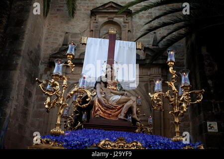 An image of the Virgin Mary carrying Jesus Christ is displayed by Angustias Brotherhood during Easter Week celebrations in Baeza, Jaen Province, Andal Stock Photo