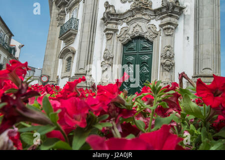 Portuguese ancient building with roses in the foreground Stock Photo