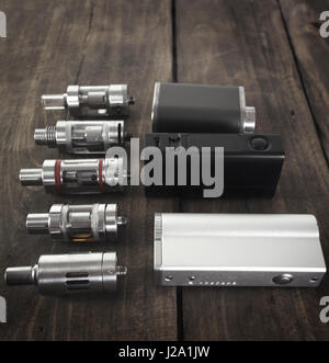 Advanced personal vaporizer or e-cigarette on the table Stock Photo