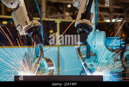 Close up torch body of robot welding Stock Photo