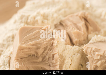 fresh yeast on table closeup Stock Photo