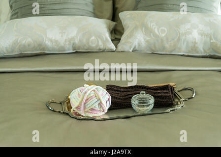 tray of crochet on bed in luxury bedroom Stock Photo