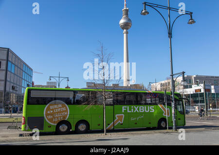 Bus stop of Flixbus company, a German long distance bus service through out Germany and Europe, Berlin, Alexander Square, Germany, Berlin TV Tower, Stock Photo