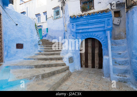Morocco, Chefchaouen or Chaouen is the chief town of the province of the same name. It is most noted for its small narrow streets and neighborhoods painted in variety of vivid blue colors. Stock Photo