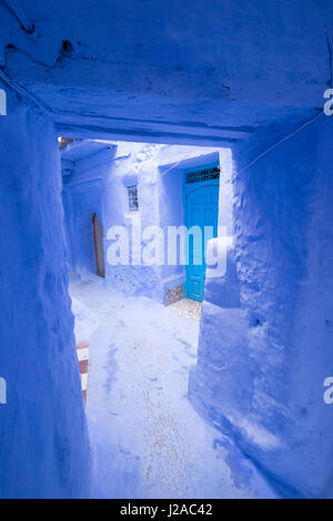 Morocco, Chefchaouen or Chaouen is the chief town of the province of the same name. It is most noted for its small narrow streets and neighborhoods painted in variety of vivid blue colors. Stock Photo