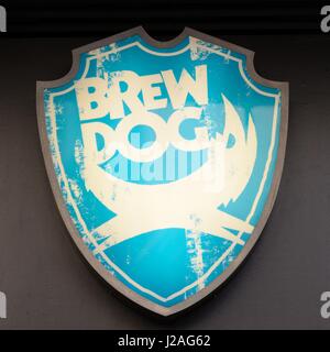 Illuminated logo sign of the Brewdog craft beer brewing company based in Scotland Stock Photo