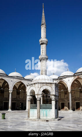 The inner courtyard of Sultan Ahmed Mosque (Blue Mosque, Sultan Ahmet Camii) with ablutions fountain in the center, Istanbul, Turkey Stock Photo