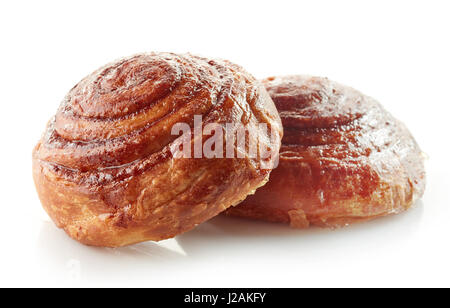 freshly baked cinnamon rolls isolated on white background Stock Photo