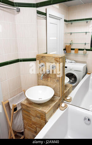 Small modern bathroom interior. Well organized space. Stock Photo