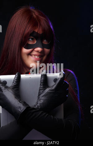 Happy thief in black gloves Stock Photo