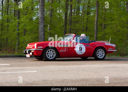 HEIDENHEIM, GERMANY - MAY 4, 2013: Wolfgang Smuda and Norbert Lehmann in their 1975 Triumph Spitfire 1500 at the ADAC Wurttemberg Historic Rallye 2013 Stock Photo