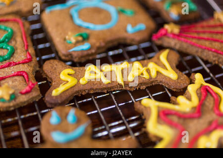 High angle close up of Gingerbread Men on a baking tray. Stock Photo by  Mint_Images